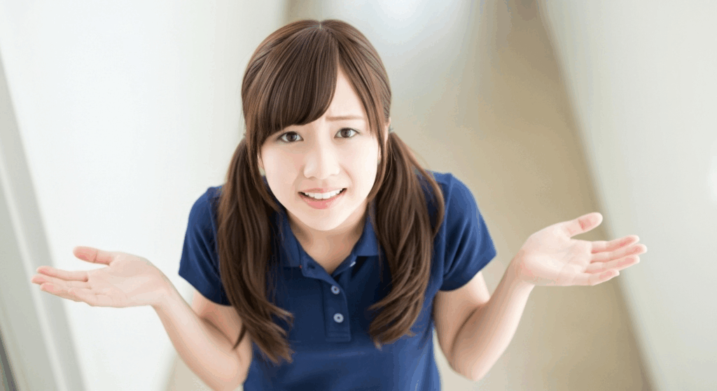 「さぁー?」と言う感じの悩んでいる、女性介護職員